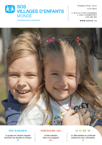 Couverture du bulletin 2 2022 avec deux enfants Ukrainiens souriant